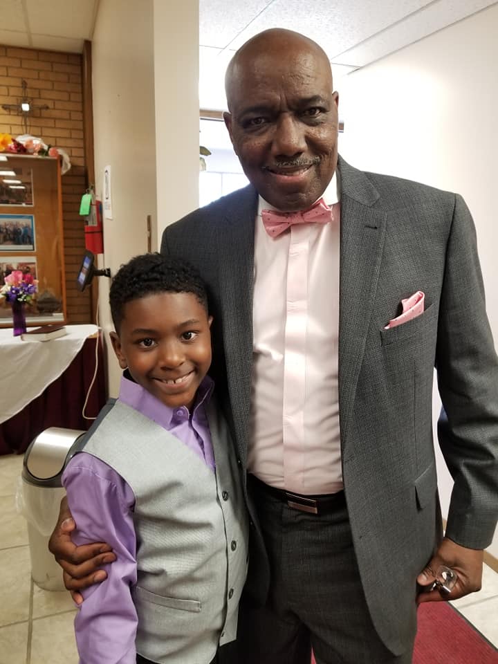 Pastor Obleton with a young ministry worshiper